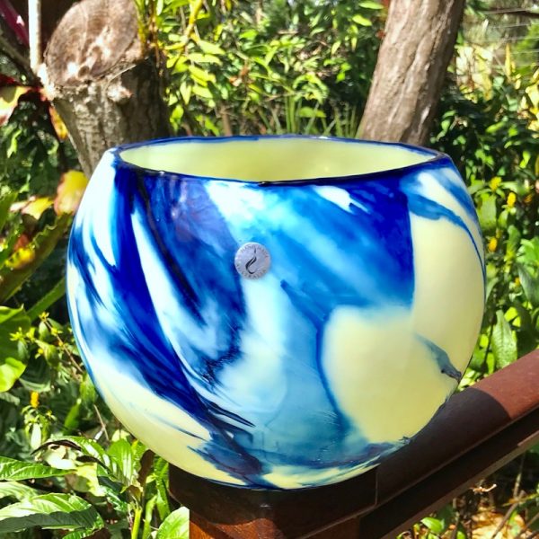 Sunshine highlights the variations in hues of this large Blue on Blue Flare lantern. Photo - Artist's personal collection