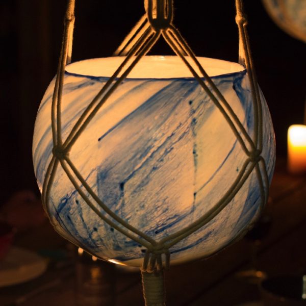 Hand made, 100% cotton macrame hangers are available to suit large and small lanterns. Photo by Integrity Candles.