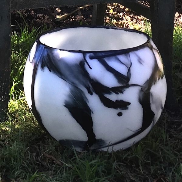 A Large Ebony on Ivory lantern makes a statement in any setting. Photo: Integrity Candles