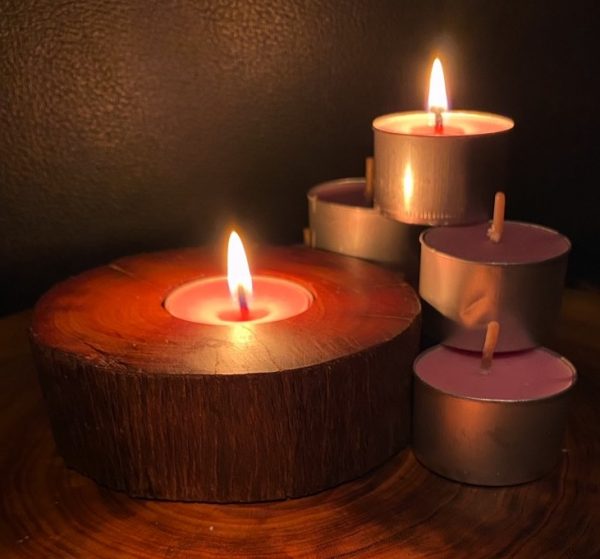 Each scented tea-light cup burns brightly for eight hours.