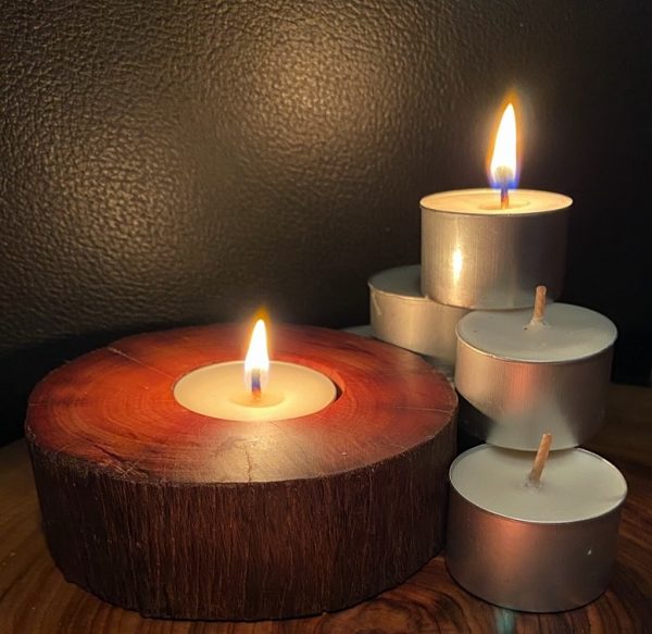 Each scented tea-light cup burns brightly for eight hours.