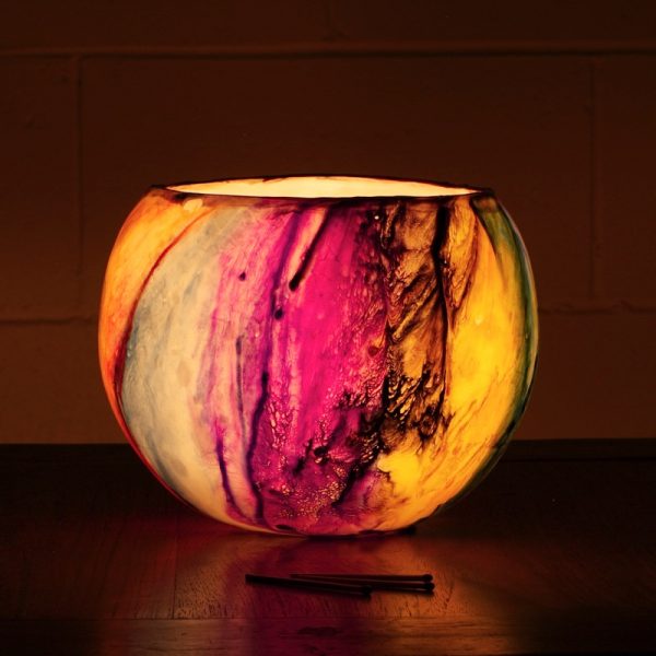 The Cosmos lantern comes dramatically to life when lit by a brightly burning Votive. Photo by Frank Gumley