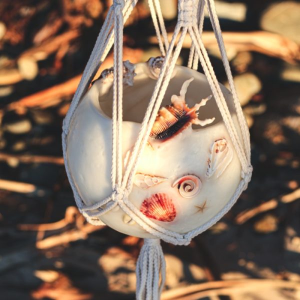 Hand-made, 100% cotton macrame hangers enhance your lantern, indoors or out. Photo by Kim Vecie.