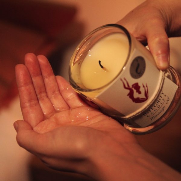 Extinguish the flame and carefully apply a small amount of oil into the palm of your hand. 