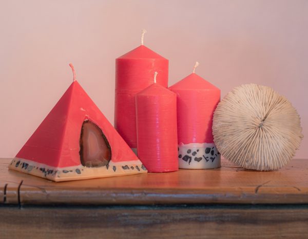 Pillar Candles and Pyramid Candles are colour-coded and scent-matched throughout the range.