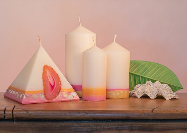 Pillar Candles and Pyramid Candles are colour-coded and scent-matched throughout the range.