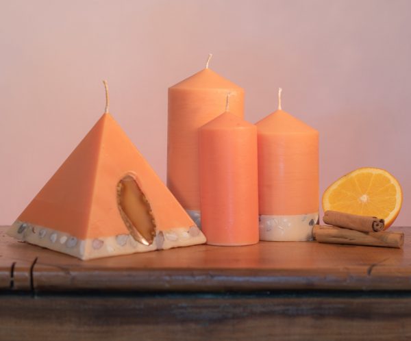 Pillar Candles and Pyramid Candles are colour-coded and scent-matched throughout the range.