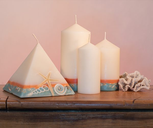 Pillar Candles and Pyramid Candles are colour-coded and scent-matched throughout the range.