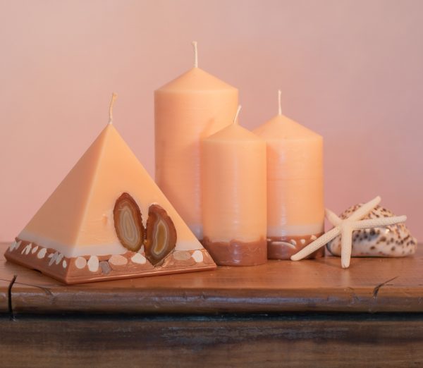 Pillar Candles and Pyramid Candles are colour-coded and scent-matched throughout the range.