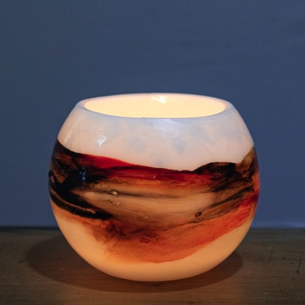 The haunting, ever-changing hues of the Red Centre. Photo: Integrity Candles.