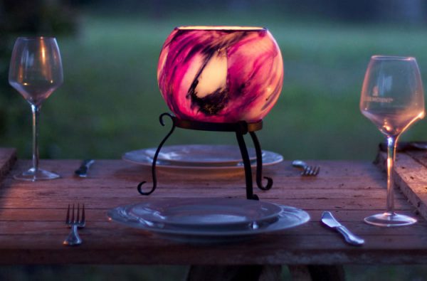 Powder coated steel stands allow your lantern to sit proud on your table. Photo: Integrity Candles
